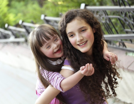 Two children smiling